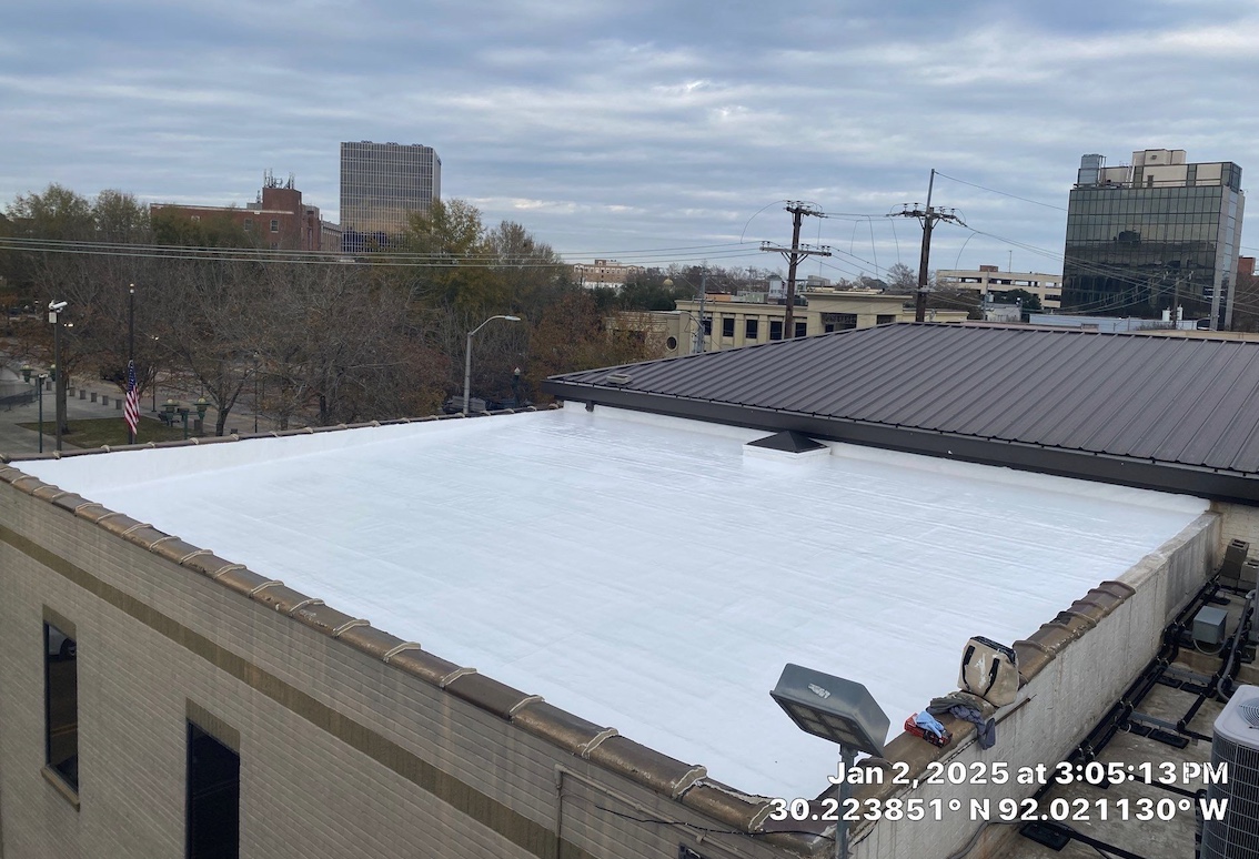 Completed flat roof restoration on commercial building in downtown Lafayette